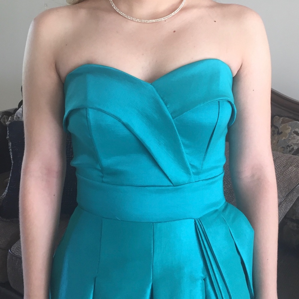 Formal dress. Teal green. Floor length.